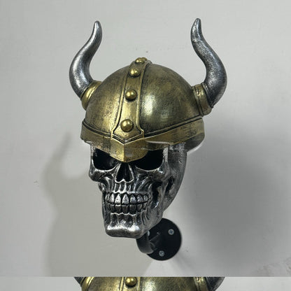 Decorative helmet holder with skull made of synthetic resin