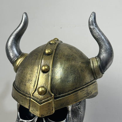 Decorative helmet holder with skull made of synthetic resin